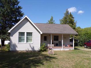 6407 E Gill Rd, Carp Lake, MI 49718