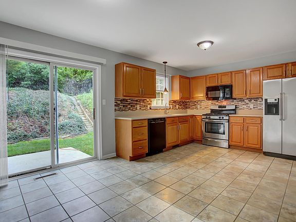 updated kitchen with brand new gas range and quartz countertops!