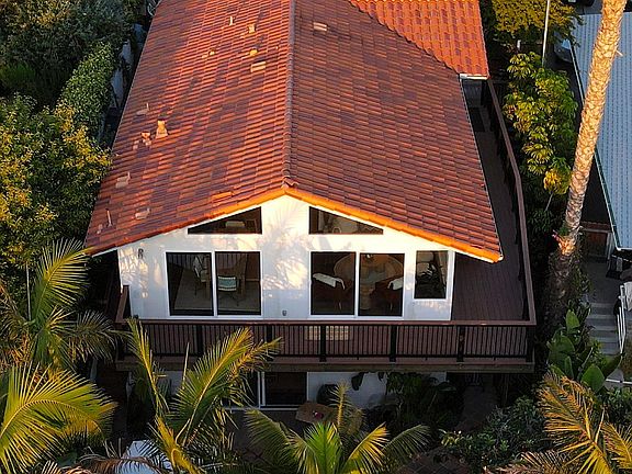 Spanish style tiles and tropical gardens