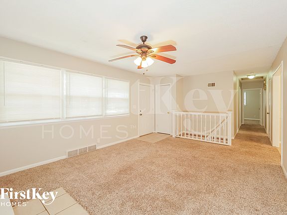 3rd image of 12405 E 52nd Ter S