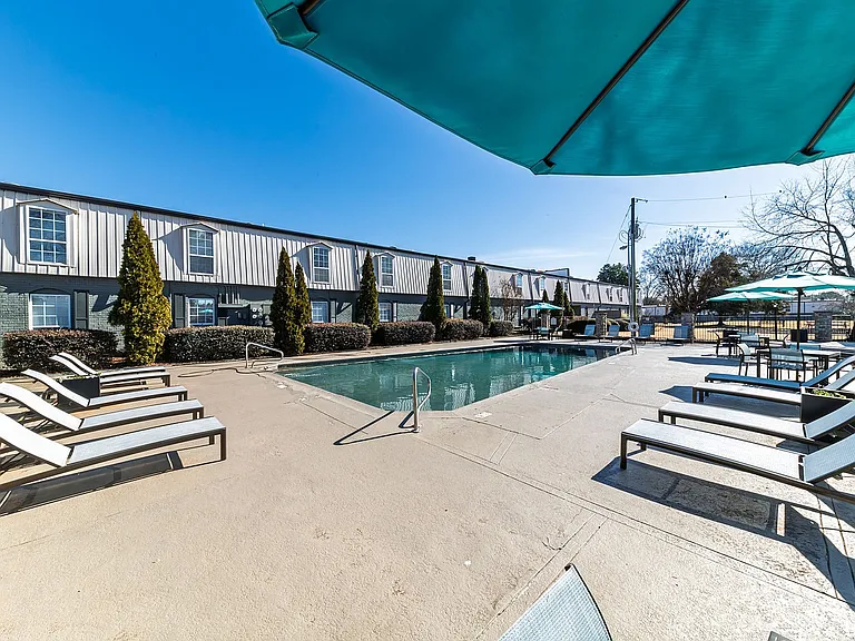 Relax and unwind in this serene poolside setting, perfect for sunny afternoons.
