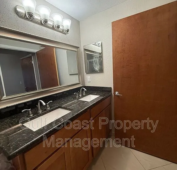 8555 Bernwood Cove Loop #103 — Photo 13