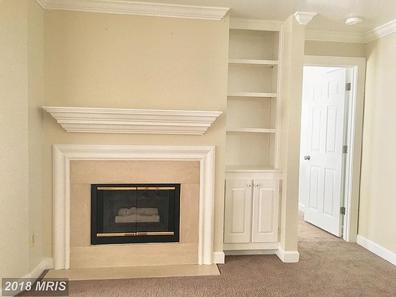 Living Room w/gas fireplace & bookcase