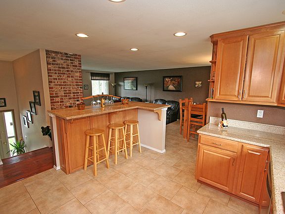 Open kitchen with tile floor