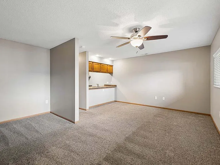 With an open layout and generous living space, this inviting room offers the flexibility to relax, entertain, or make it entirely your own.