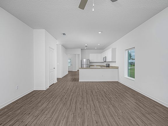 The kitchen overlooks the family room