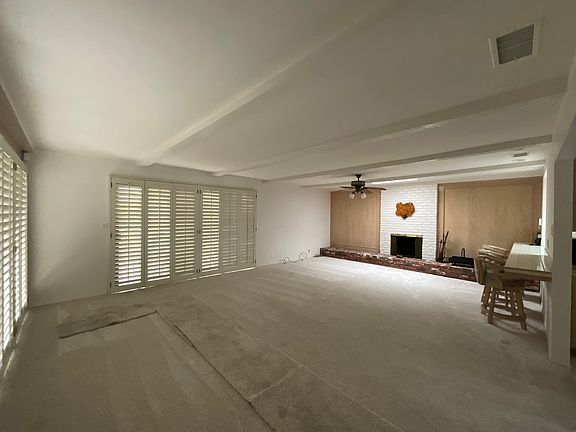 Family room with fireplace and slider to back yard