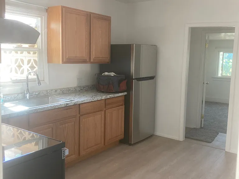 The kitchej was completely remodeled less than 2 years ago wih new counters, countertops, sink and faucet, refrigerator, stove and light fixturesl
