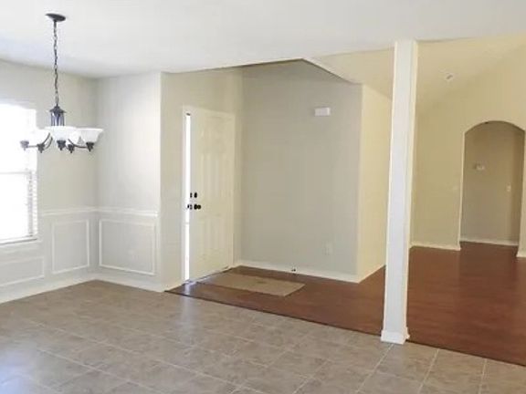 Front Door Entrance & Partial of Dinning Room #1