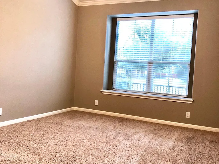 Large master bedroom, window sill large enough for a sunny reading corner