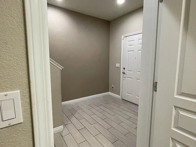 1st Floor - this view is from inside the office/extra space room. Plenty of space for additional storage or can be used as an office space or a mini home gym.