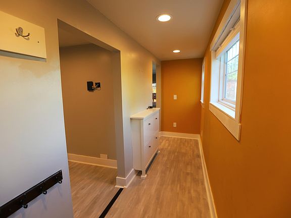 Mudroom, laundry to immediate left, kitchen on second left.
