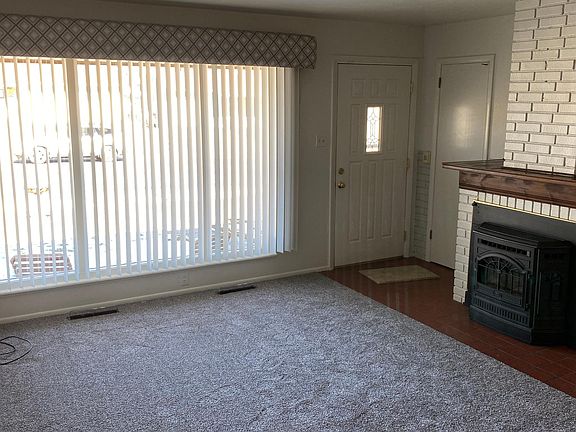 Living Room View of Entrance. Pellet Stove is NOT functional, but decorative! =)