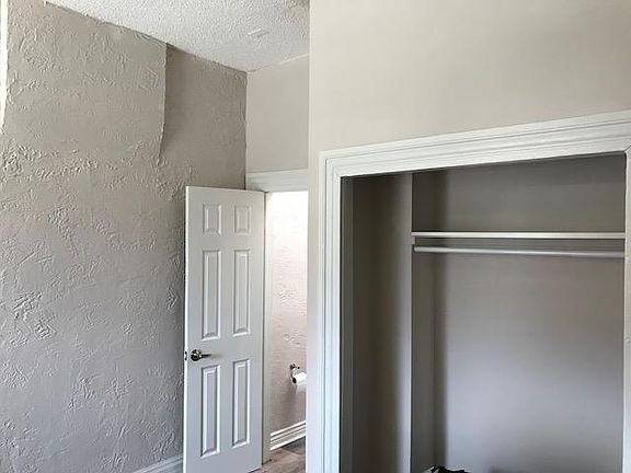 Bedroom 1 with door directly into bath