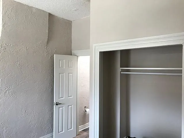 Bedroom 1 with door directly into bath