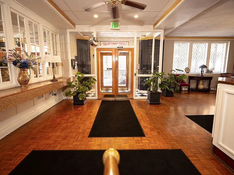 Front desk and lobby with 24-hr concierge and security