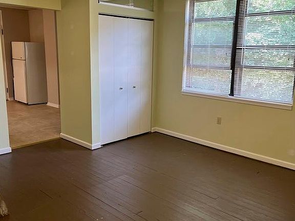Living Room Area with Large Closet, storage above.