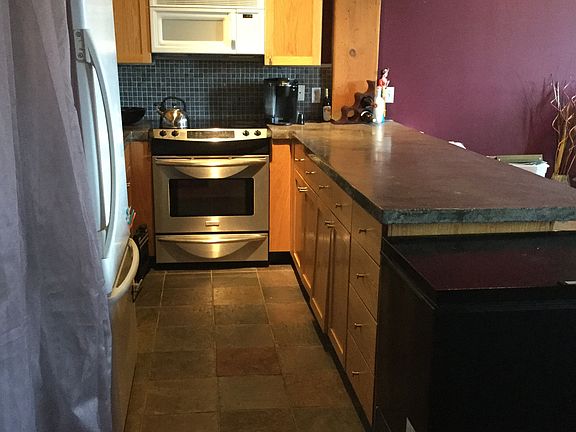 Kitchen with a lot of storage cupboards
