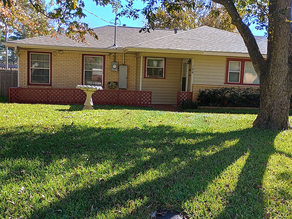 Nice curb appeal. Two large pecan producing trees