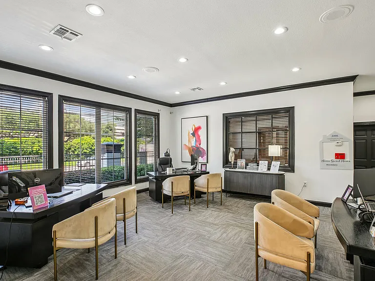 Explore our modern leasing office at Providence Uptown, where our dedicated team is ready to assist you in finding your perfect home in the heart of Houston's Uptown District.