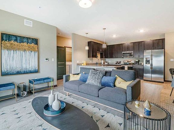 At WH Flats, live with a seamless flow between the kitchen, dining, and living areas, perfect for entertaining or relaxing at home.