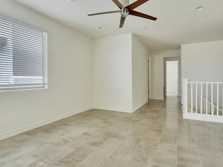 Ceramic tiled loft for extra living space for a large couch and TV or pool table, etc. Just a great entertainment area!