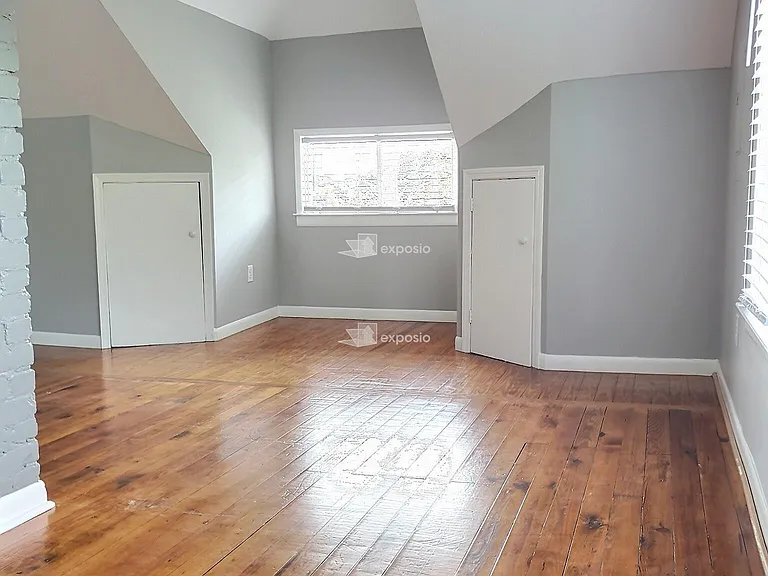 view of living room from dining area TALL CEILINGS
