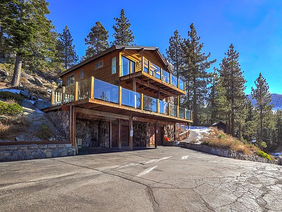 Front of house. 2 outdoor parking spaces
