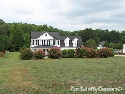 Beautiful, low maintenance landscaping
						:
						Large (28x20) 2-car garage. Driveway ends with parking pad big for 3 vehicles.