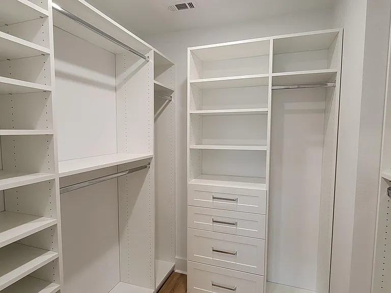 Custom Walk in Primary Closet-Shoe Shelves, Drawers, Long and Short Hanging