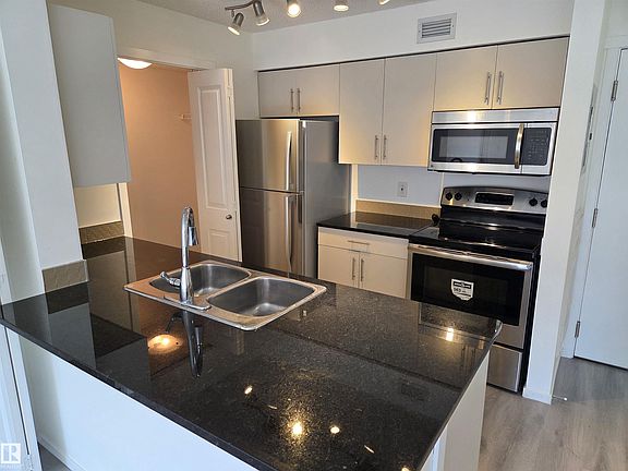2nd image of 5816 Mullen Pl NW #309
