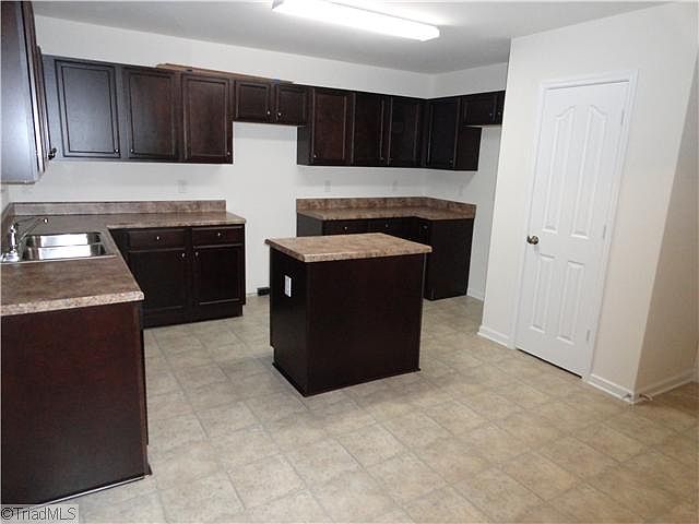 Home in photo is SIMILAR