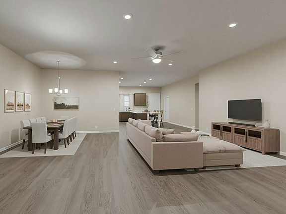 Inside, enjoy a spacious, open living area with airy 10-foot ceilings. Artist s rendering