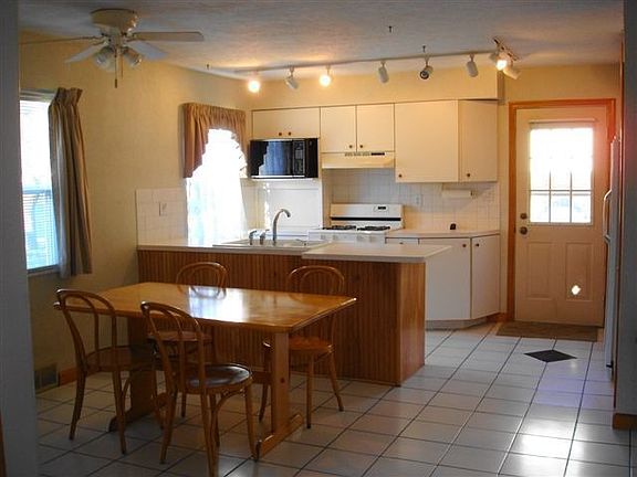 Kitchen with Newer Appliances and Ceramic Floor opened to Dining Room