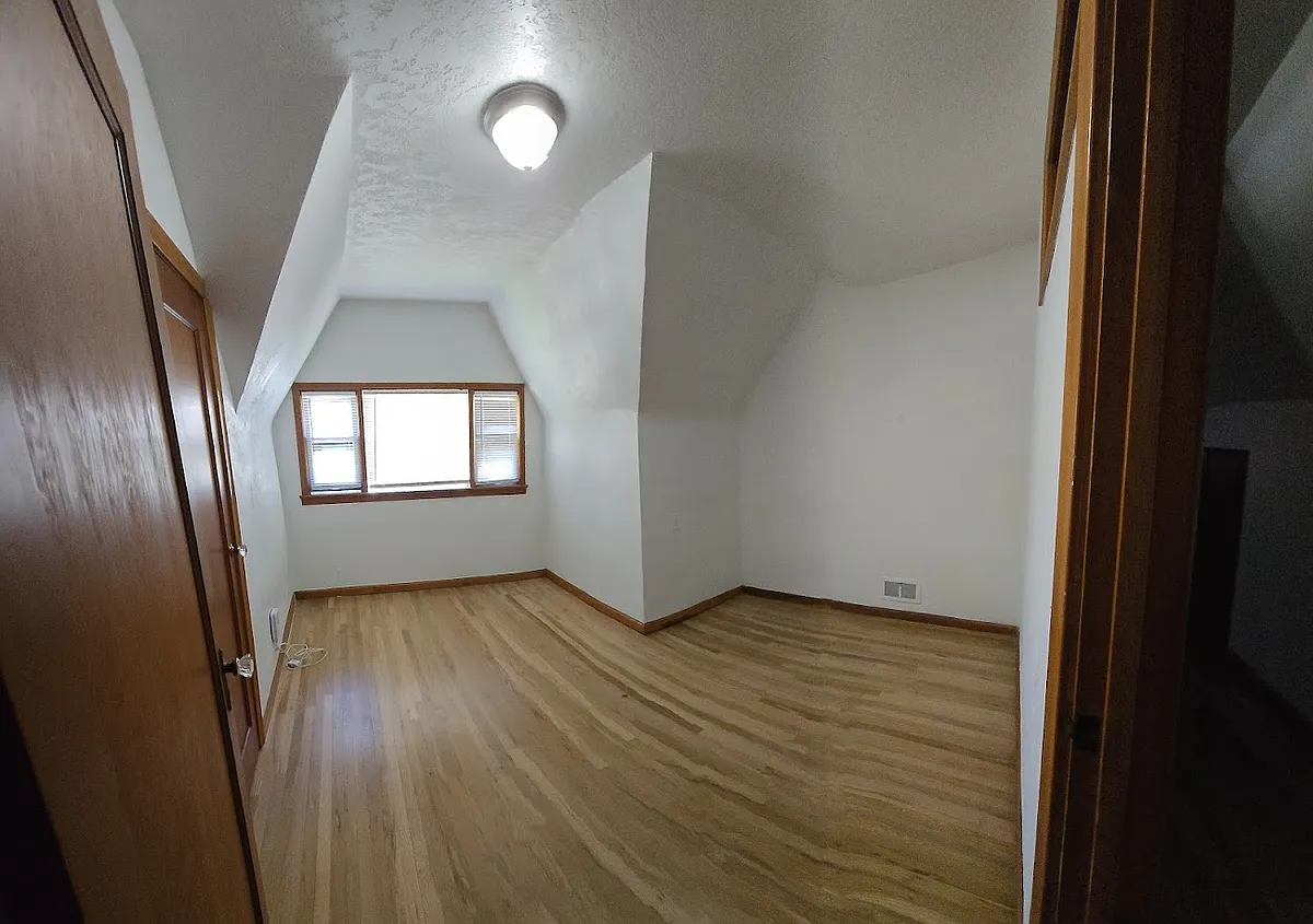 Bedroom 1 measures 11 1/2 ft x 13 ft (minus 4' x 5' corner) - 4805 W Denton St #3