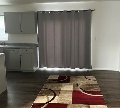 Dining room has an open concept leading to the patio door and deck!