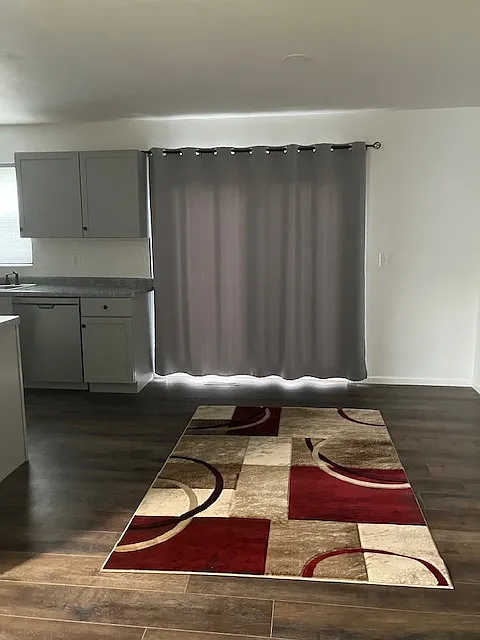 Dining room has an open concept leading to the patio door and deck!