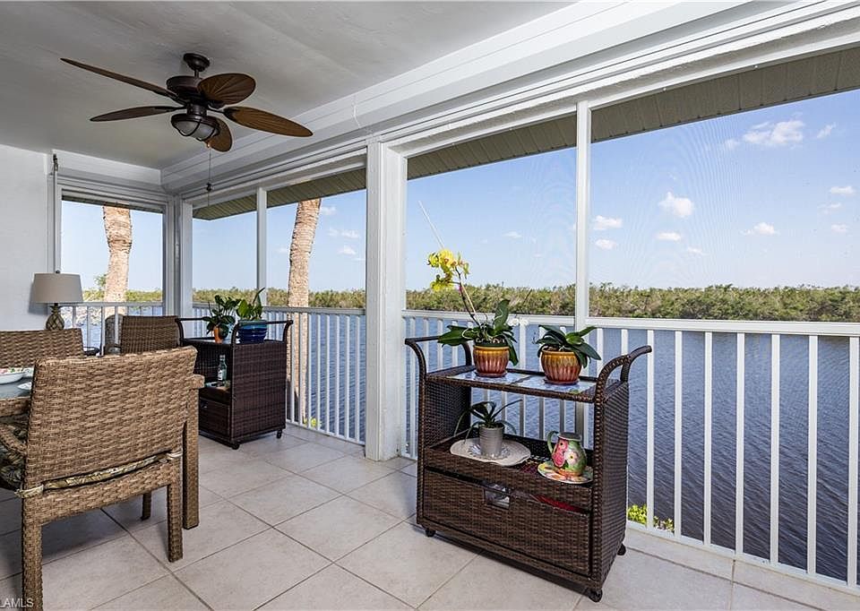 Fully screened lanai with remote control Armor Screen hurricane shutters.