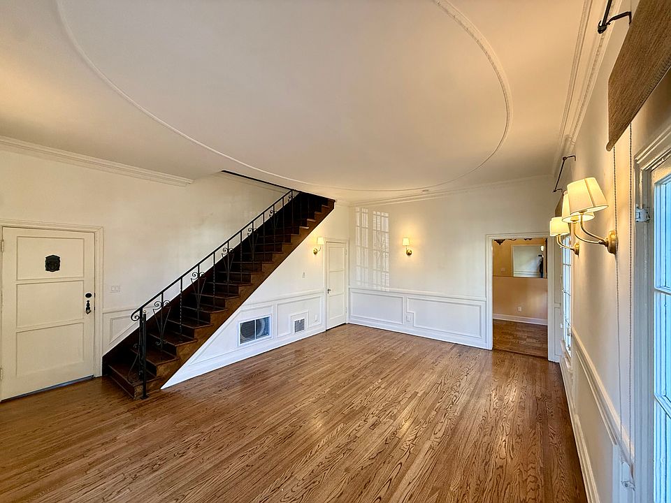 Grand formal living room with soaring high ceilings