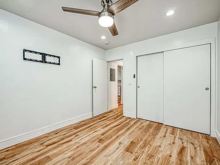 Bedroom: TV Mount & Ceiling Fan, LED Lighting, LVP Flooring, Central Heating & Cooling, New Windows.