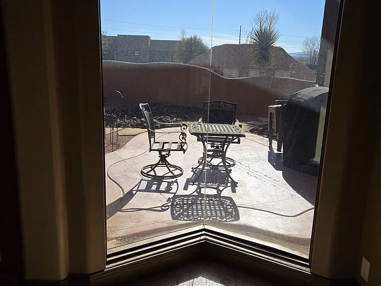 side patio looking from inside the house just as you walk into the house