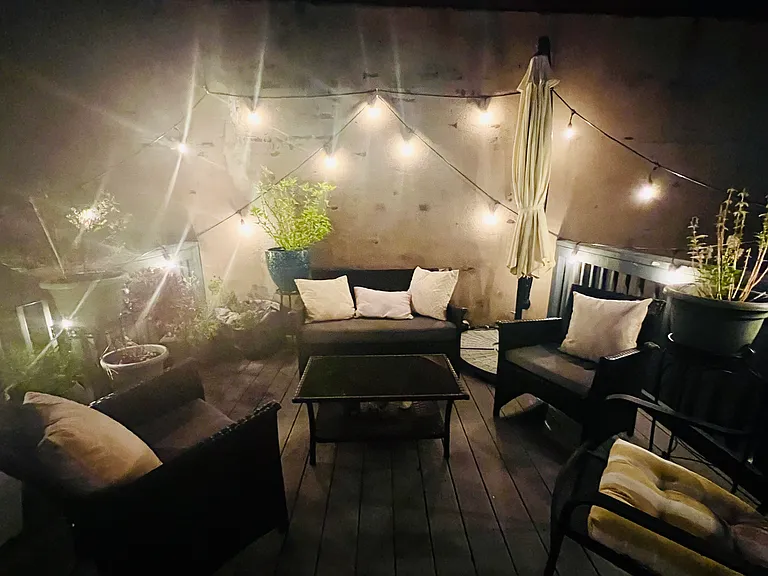 Roof Deck at night as dressed by current tenants.