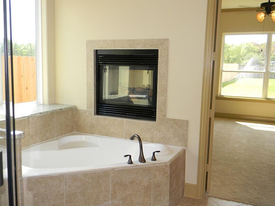  GORGOUS DOUBLE SIDED GAS LOG FIREPLACE,**HOME SHOWN NOT ACTUAL HOME***