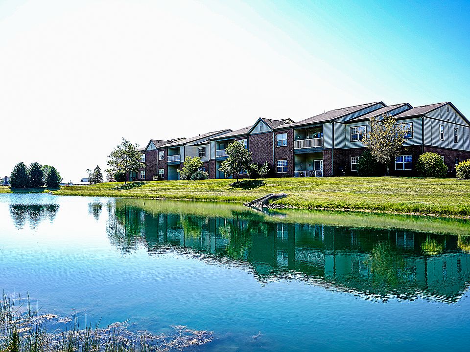 Peaceful views and natural beauty _ our scenic pond adds to the charm of life at Gateway Crossing, right outside your door.