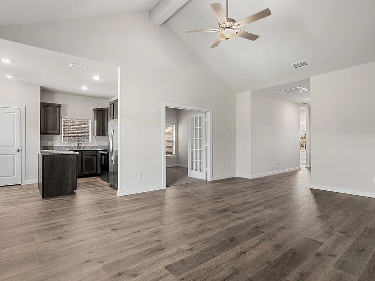 The living room sits right off of the kitchen.
