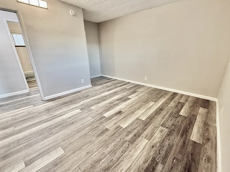 Large Bedroom with alcove for a desk.