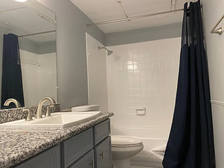 Bathroom New tile sink and new applicances.