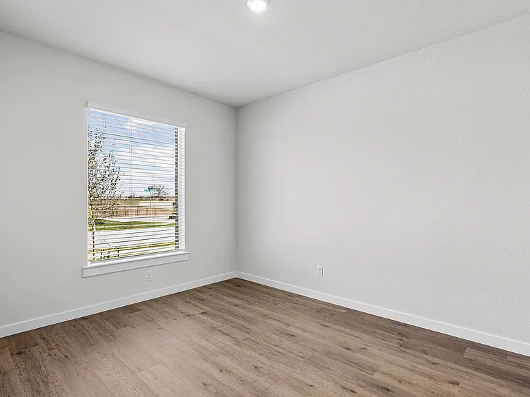 The dining room sits right off of the kitchen.