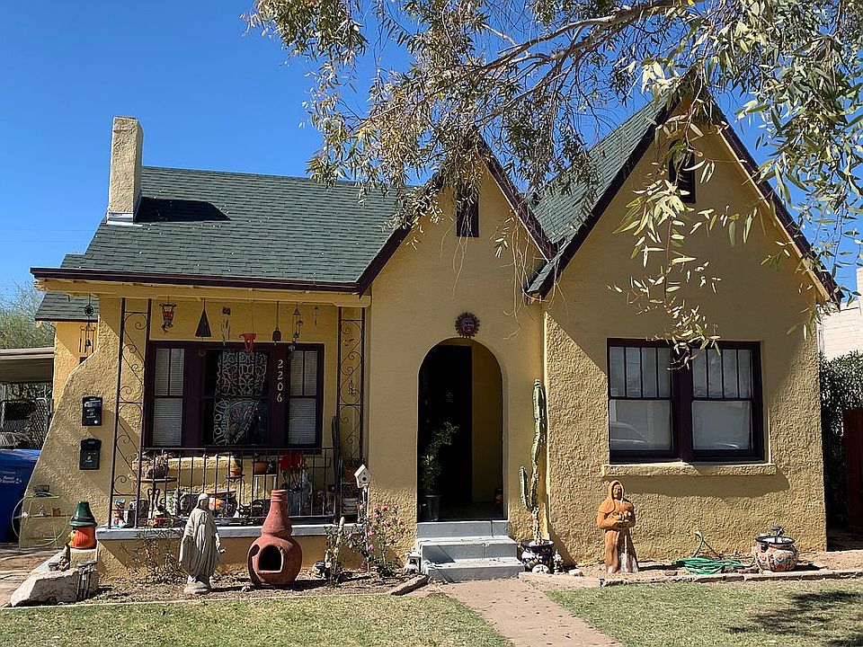 Yellow w/purple trim house