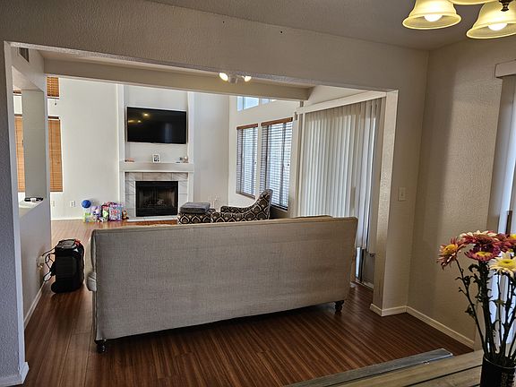 View from Dining area to living area. TV and furniture not included.